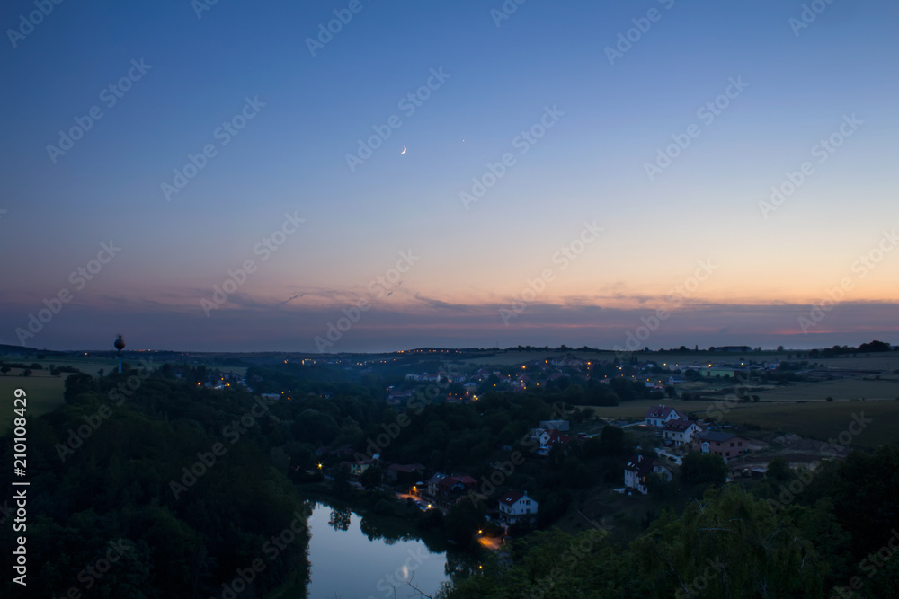 View from Ales lookout to Czech landscape in sunset, blue hour