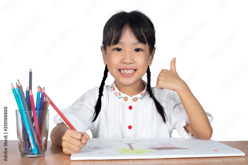 Asian Little Chinese girl painting on paper Asian Little Chinese girl painting on paper