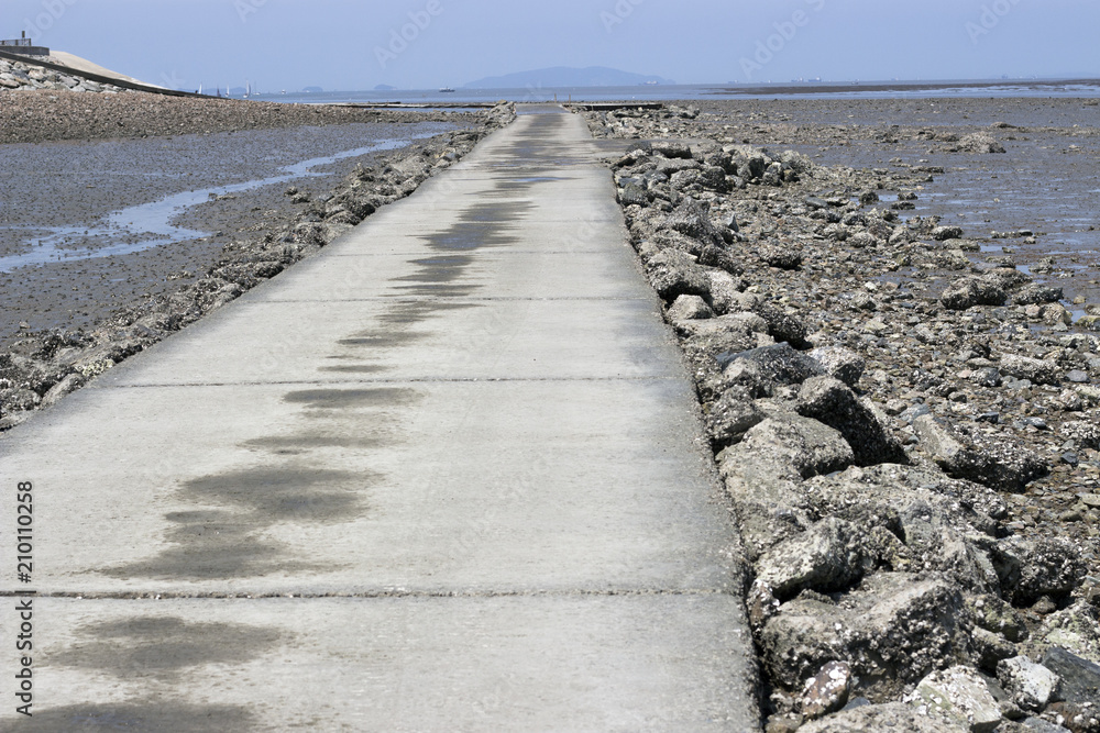 Long Stony Road to the sea after low tide, concept way, Ansan, South Korea