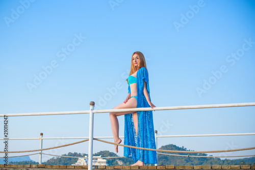 Beautiful Girl at warm country. Travel and Vacation. Freedom Concept. Sensual red hair beautiful woman, lady with perfect fashionable body figure ,Marine style  © T.Den_Team