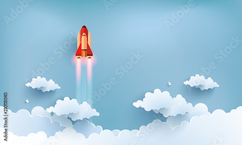 illustration of the shuttle. flying across beautiful clouds at full speed. paper art design