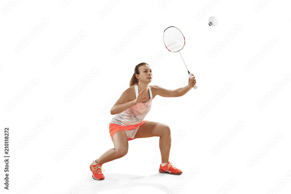Young woman playing badminton over white background Young woman playing badminton over white background