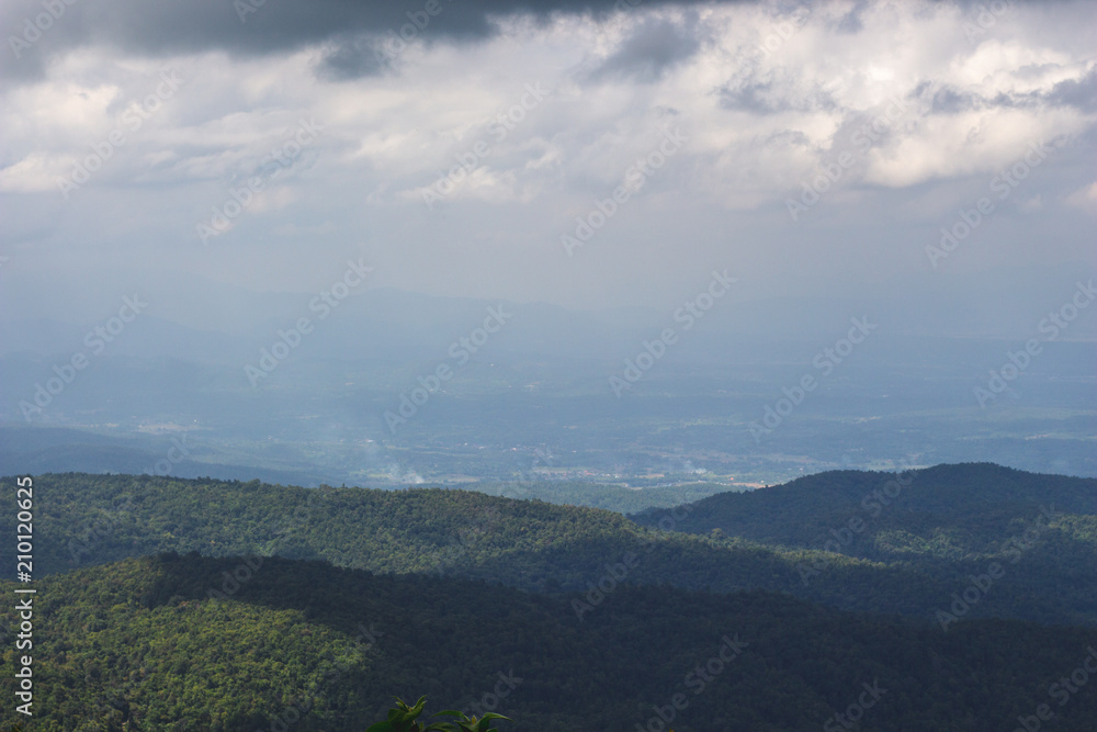 Mountain view and blue sky with beautiful white clouds.