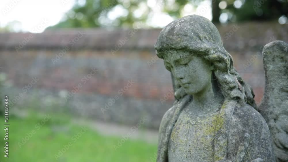 Cemetery in England - Angel gravestone Cemetery in England - Angel gravestone