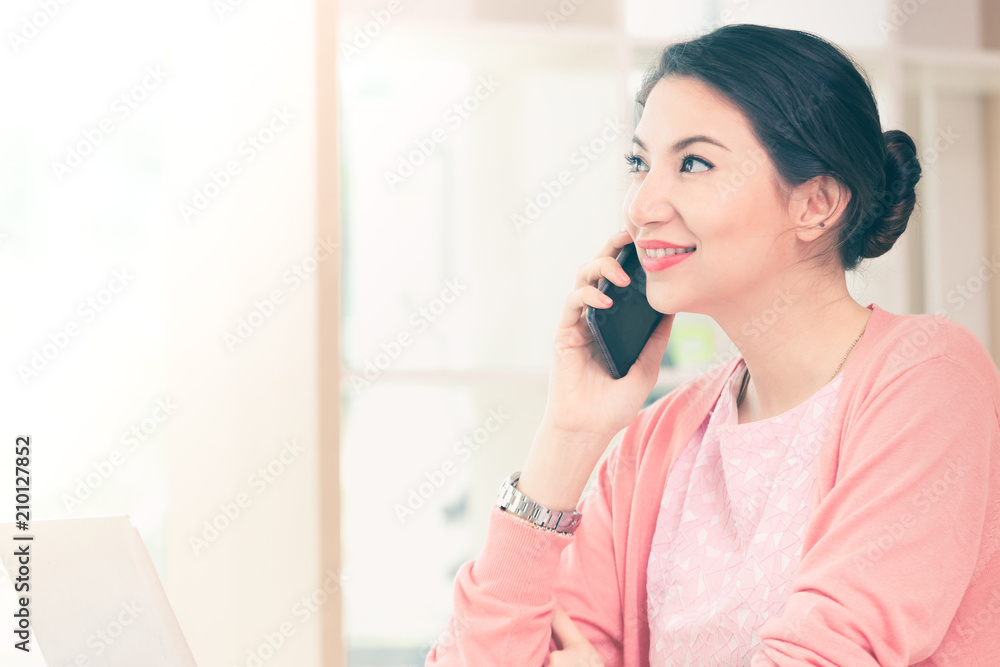 attractive businesswoman holding sitting working her small business from home attractive businesswoman holding sitting working her small business from home