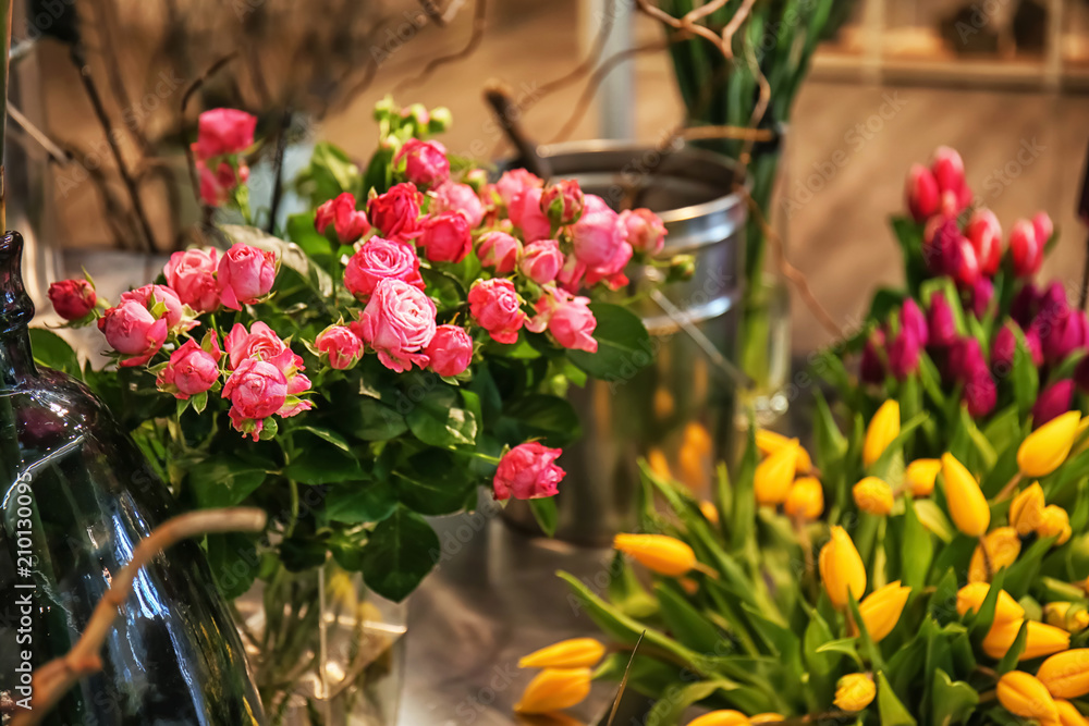 Beautiful pink roses in flower shop