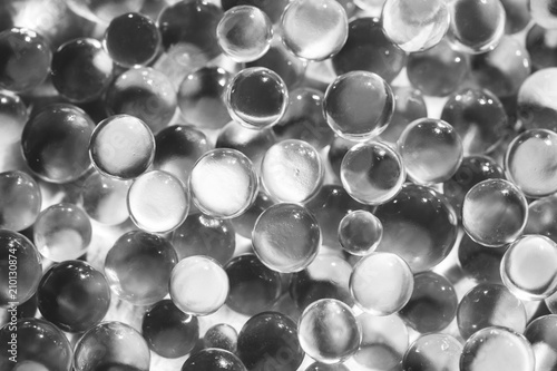Valokuvatapetti Little glass balls in direct sunlight, macro