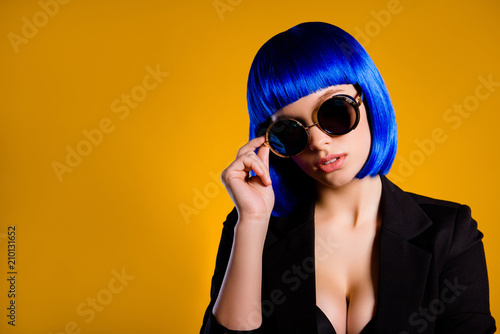 Cuadro en lienzo Portrait with copy space empty place of luxury cool girl in vivid blue wig glass