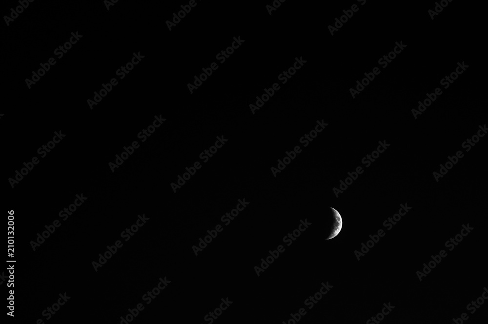 High contrast Waxing crescent moon seen with telescope High contrast Waxing crescent moon seen with telescope