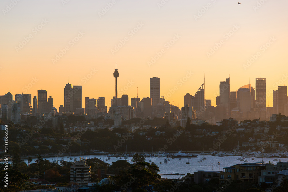 Sydney skyline with clear sky at sunset time.