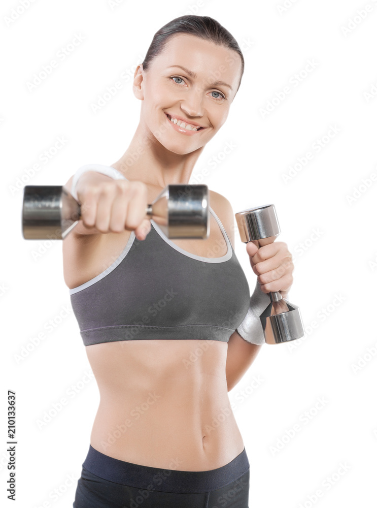 a smiling sporty female wearing sports clothes with dumbbells is a smiling sporty female wearing sports clothes with dumbbells is