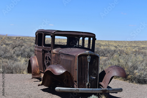 Classic Rusted Out Car on Route 66 in Arizona photo