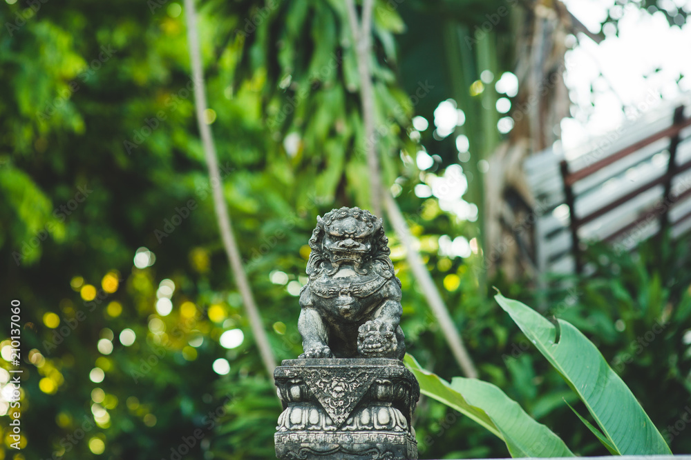 Traditional old loin statue in Thai temple Traditional old loin statue in Thai temple