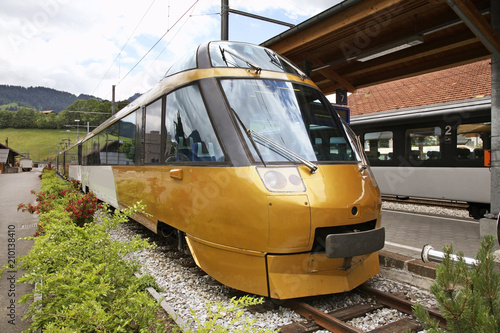 Obraz na płótnie Locomotive at railway station in Zweisimmen. Canton of Bern. Switzerland. w salonie