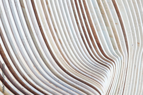 Artistic Closeup on repeat parallel pattern of wood strips with beautiful curve pattern with light.