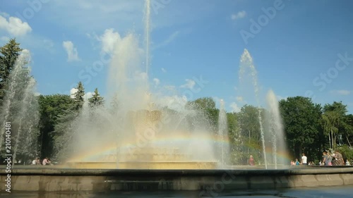 Wallpaper Mural On a large fountain in the park a beautiful rainbow formed. Water hits up. Torontodigital.ca