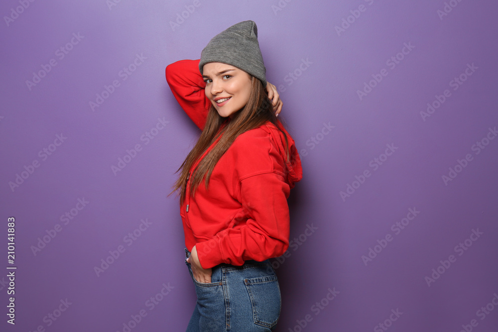 Attractive hipster girl on color background Attractive hipster girl on color background