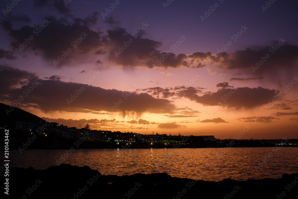 view of the sea city by the sea at sunset