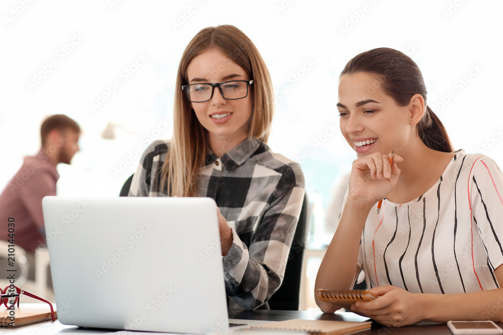 Employees having business meeting in office Employees having business meeting in office