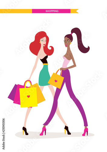 Beautiful young women with shopping bags isolated on white background