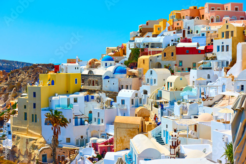 Houses of different colours in Santorini