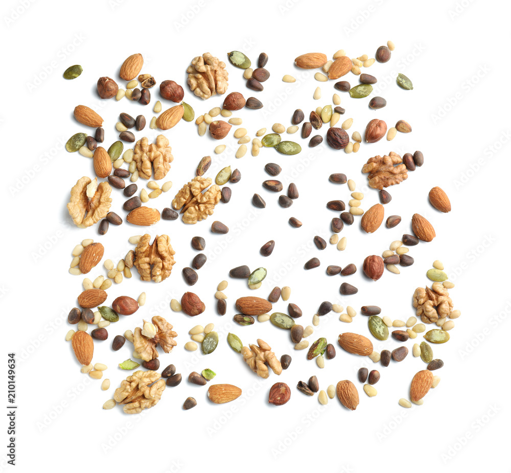 Obraz premium Different nuts on white background