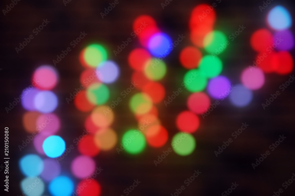 Blurred Christmas lights on dark background Blurred Christmas lights on dark background