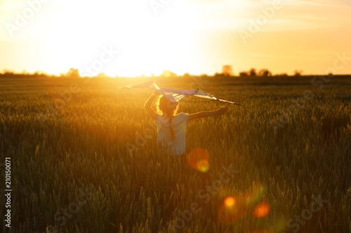 Cute little girl with kite ...