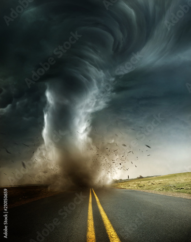 Wallpaper Mural A powerful supercell storm producing a destructive tornado touching down on an isolated country road