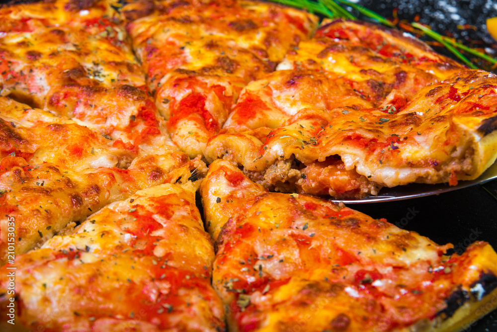 Slice of pizza cheese crust seafood topping sauce. with bell pepper vegetables delicious tasty fast food italian traditional and soft drink carbonated fresh on wooden board table classic and smoke Slice of pizza cheese crust seafood topping sauce. with bell pepper vegetables delicious tasty fast food italian traditional and soft drink carbonated fresh on wooden board table classic and smoke