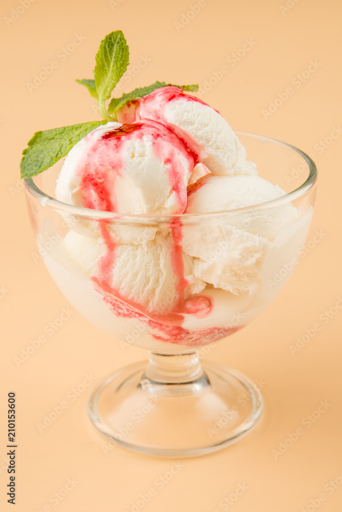 Ice cream topping in a glass beaker Ice cream topping in a glass beaker
