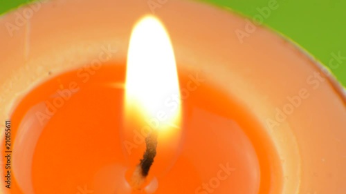 Tea candles burning, macro view photo