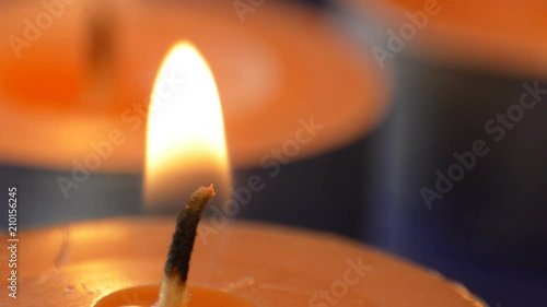 Tea candles burning, macro view