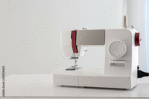 Sewing machine on table indoors