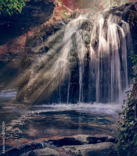 waterfall sun rays