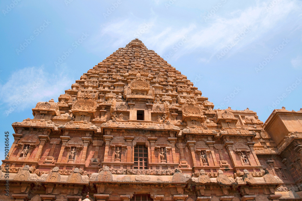 Decorated wall and gopura, Brihadisvara Temple, Tanjore, Tamil Nadu. View from West.