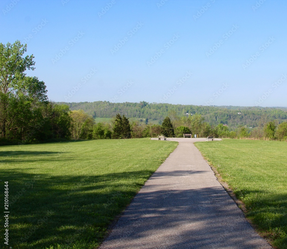 The long walkway with a view of the countryside horizon. 