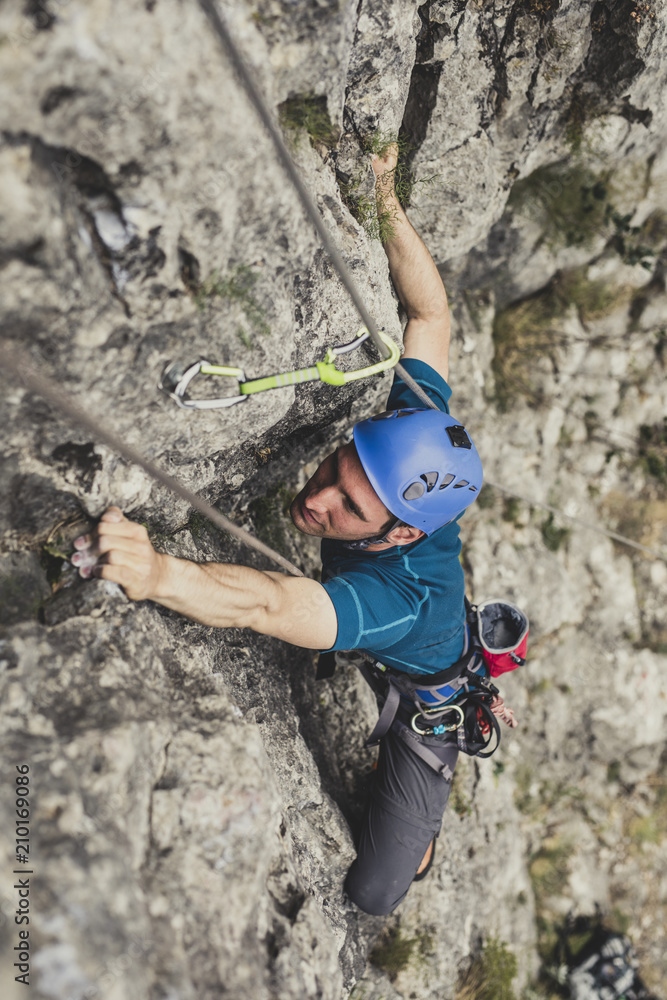 A Man Climbing a Mountain A Man Climbing a Mountain