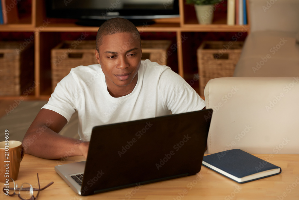 Young man working from home