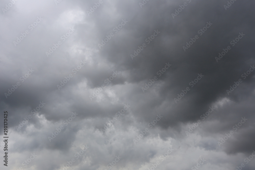 Rain clouds forming in the sky in concept of climate. Rain clouds forming in the sky in concept of climate.