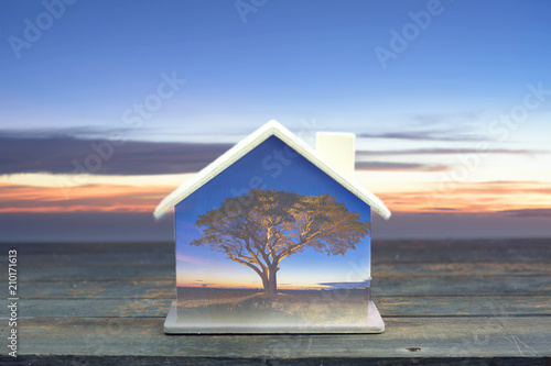 Abstract creative design with house model double exposure of nature. 