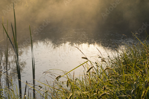 Misty morning view over the water. photo