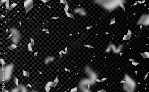 Falling silver confetti on black