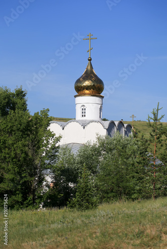 The Spassky Convent in the village of Kostomarovo. And cave temples. The dome of the Orthodox church. Chalk mountains. Voronezh region. Russia.
