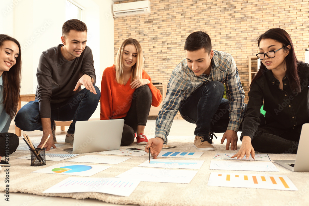 Young people having business meeting indoors Young people having business meeting indoors