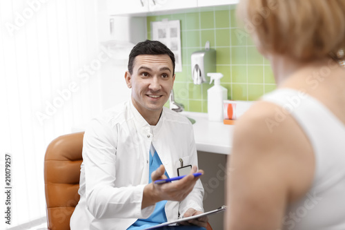 Woman visiting orthopedist in hospital