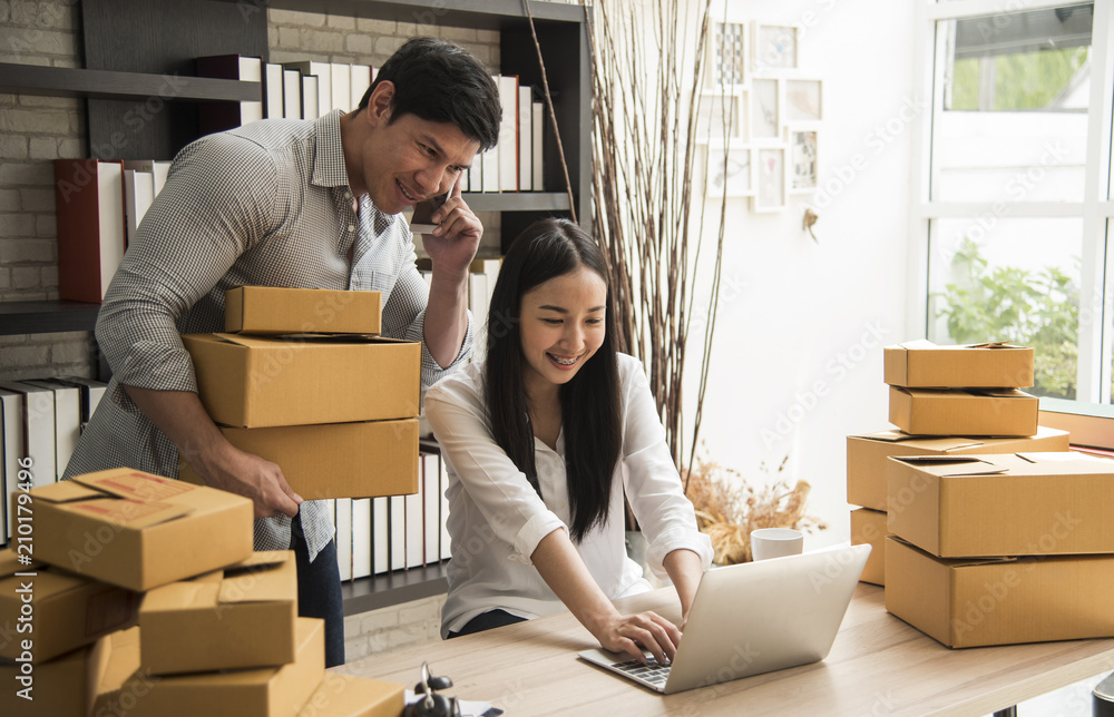 business digital online is small business a new start up in the present for online shop. By woman and man owner have a warehouse used to send to customer. SME entrepreneur concept business digital online is small business a new start up in the present for online shop. By woman and man owner have a warehouse used to send to customer. SME entrepreneur concept