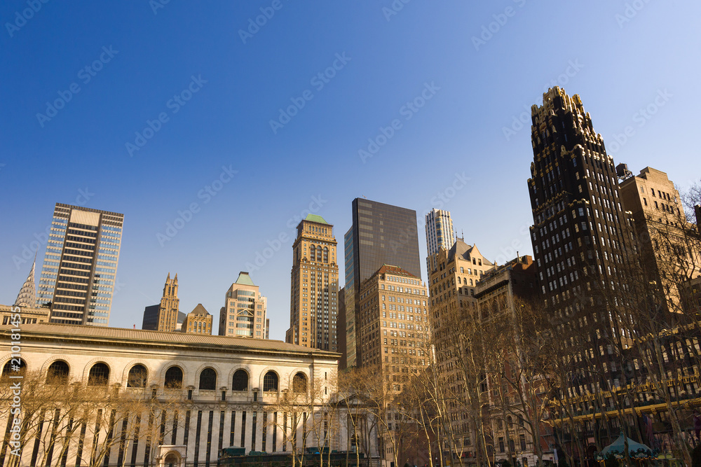Skyline of buildings at midtown Manhattan from Bryant Park, New York City, USA