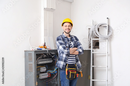 Electrician repairing distr...