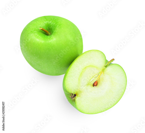 whole and hafl with slice of green apples isloated on white background